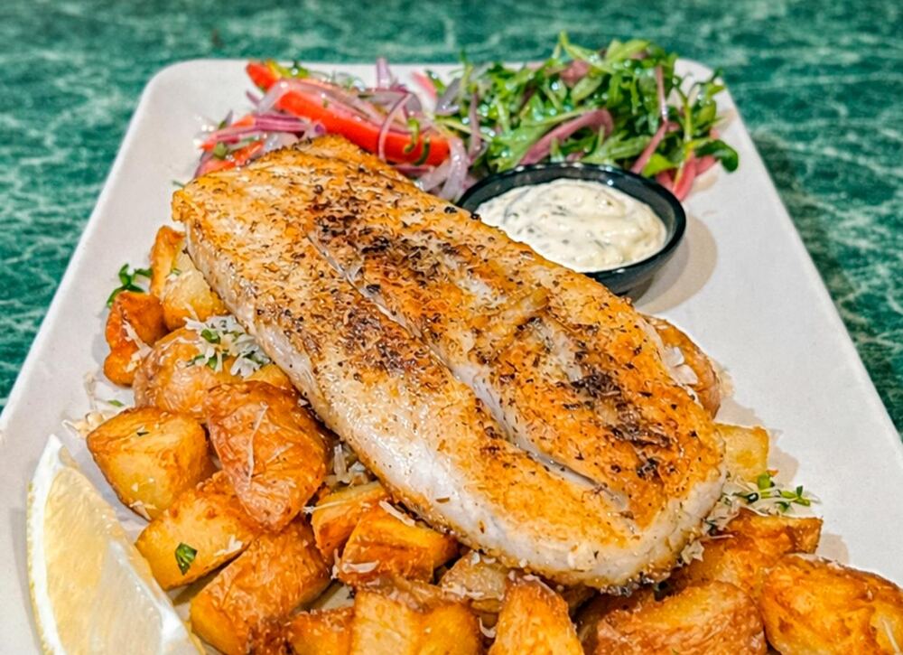 Grilled barramundi fillet with provenzal potatoes and salad